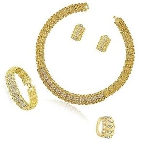conjunto de anillo, collar, pendientes y pulsera de oro amarillo