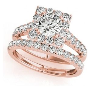 conjunto de anillos nupciales, de oro rosa de 18 k con diamantes