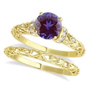 conjunto de anillos nupciales, de oro amarillo de 18 k con diamantes y alejandrita