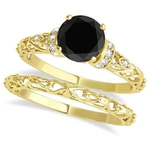 conjunto de anillos nupciales, de oro amarillo de 18 k con diamante negro