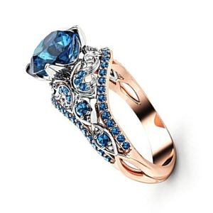 anillo de compromiso de oro rosa, estilo vintage, en oro rosa de 14k con diamante azul