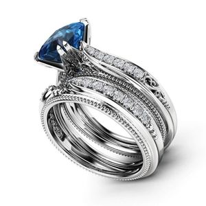 anillos de compromiso y matrimonio juntos, de oro blanco de 14k con topacio azul y diamantes blancos