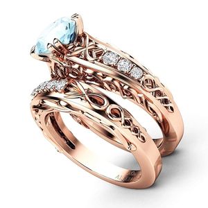anillos de compromiso y matrimonio juntos, de oro rosa de 14k con aguamarina y diamantes blancos