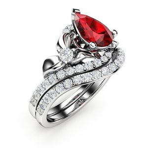 anillos de compromiso y matrimonio juntos, de oro blanco de 14k, estilo floral con bubi en forma de pera y bandas de diamantes blancos