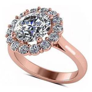 anillo de compromiso de oro rosa de 18k con halo acentuado de diamantes