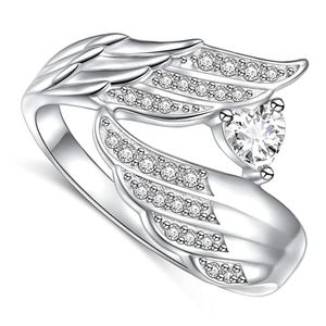 anillo de pureza, estilo alas de angel, de plata de ley 925 con corazon de circonita cubica